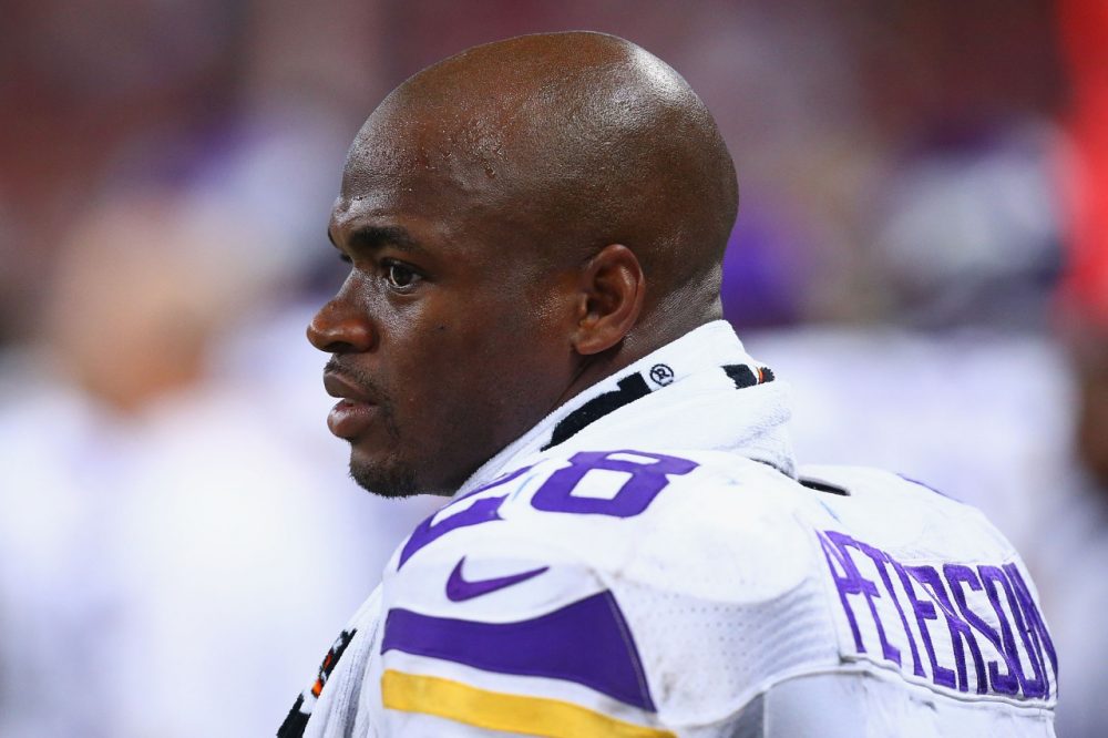 Adrian Peterson has been placed on the exempt-commissioner's permission list, which means he will not be able to participate in team activities. (Dilip Vishwanat/Getty Images)