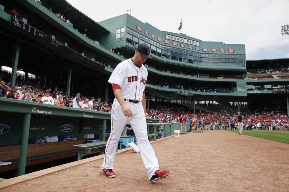 The Red Sox's Jon Lester heads to the bull pen before a game against the Kansas City Royals at Fenway on Sunday, July 20, 2014. (Michael Dwyer/AP)