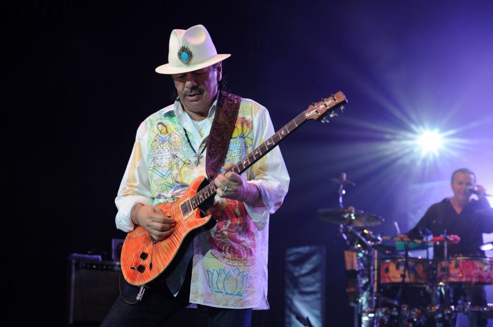 Carlos Santana performs at the Seminole Hotel and Casinos Hard Rock Live on May 2, 2014 in Hollywood, Florida. (Photo by Jeff Daly/Invision/AP)