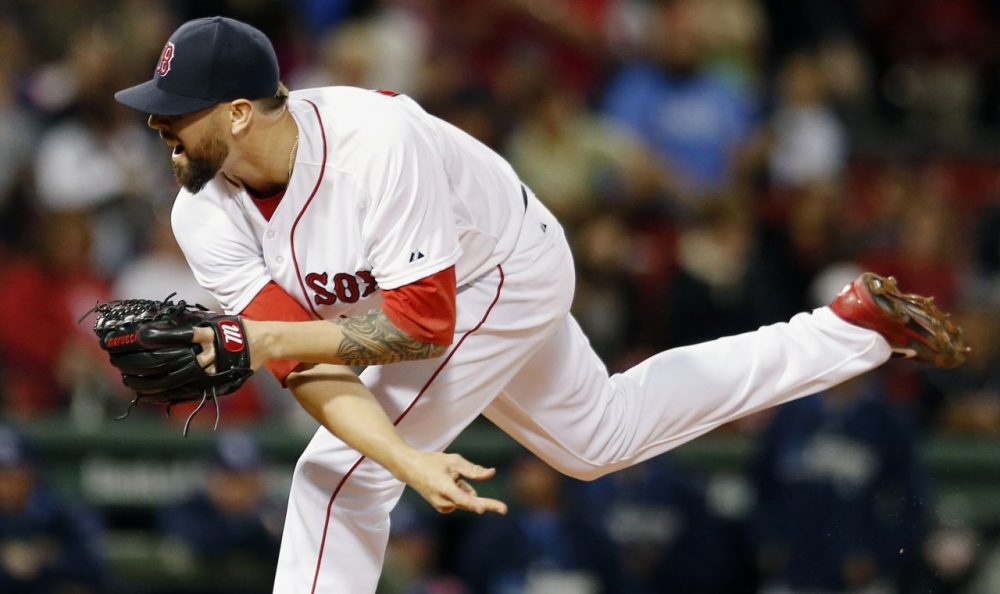 Boston Red Sox's Anthony Ranaudo follows through on a pitch during the first inning of a baseball game against the Tampa Bay Rays in Boston, Wednesday night.  (Michael Dwyer/AP)