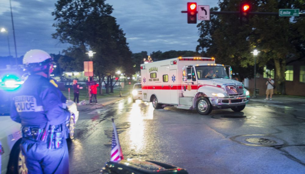 The ambulance transporting Dr. Rick Sacra, who was infected with Ebola while serving as an obstetrician in Liberia, arrives to the Nebraska Medical Center in Omaha Friday. (Nati Harnik/AP)