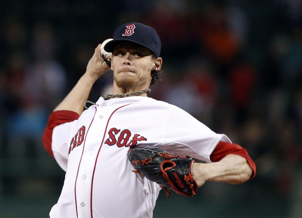 Tampa Bay scored five runs against Boston Red Sox starting pitcher Clay Buchholz with two out in the eighth inning to win 6-2  at Fenway Park in Boston, Tuesday night. (Elise Amendola/AP)