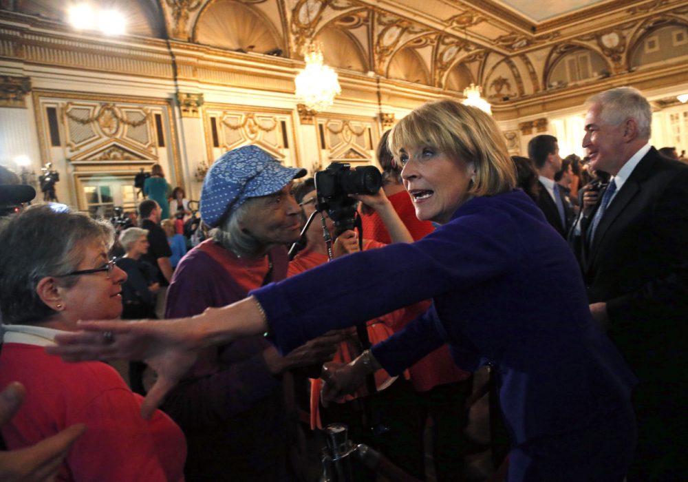 Martha Coakley greets supporters after delivering her victory speech in the Democratic gubernatorial primary Tuesday. (Elise Amendola/AP)