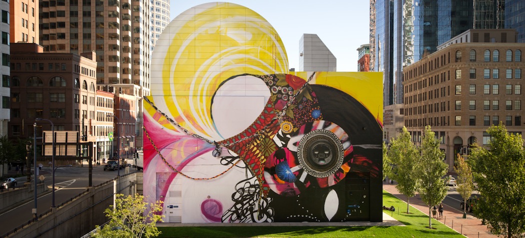 The Greenway Wall in Dewey Square has a new look -- a colorful mural called &quot;Seven Moon Junction&quot; created by artist Shinique Smith. (Geoff Hargadon via Rose Kennedy Greenway Conservancy)