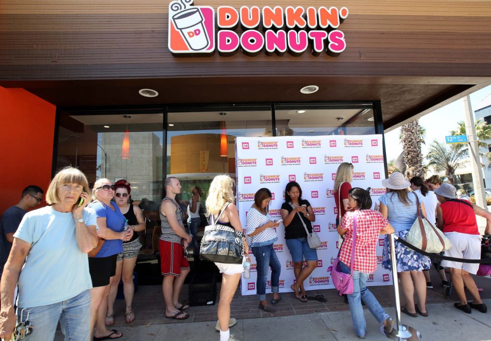 Fans line up for the opening of a Dunkin' Donuts store in Santa Monica, Calif. on Sept. 2. (Nick Ut/AP)