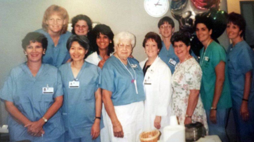 Naimy Gabour Lees, center, surrounded by staff at the hospital where she volunteered for decades. (Courtesy of Lucy Milton) 