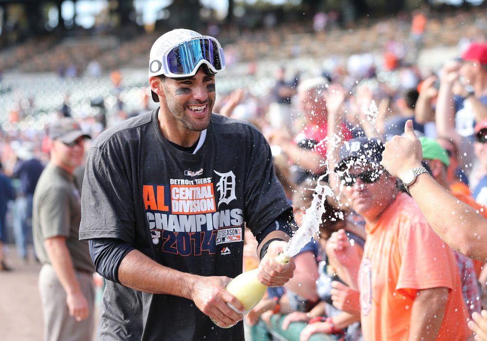 J.D.Martinez #28 of the Detroit Tigers celebrates with the fans a win over the Minnesota Twins and a Central Division Championship at Comerica Park on September 28, 2014. The Tigers will play the Orioles in the playoffs. tonight. (Leon Halip/Getty Images)