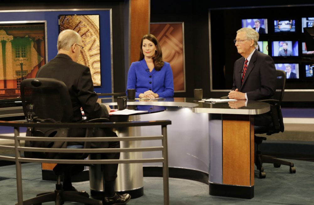 U.S. Senate Minority Leader Mitch McConnell (R) Ky., right, and  Democratic opponent, Kentucky Secretary of State Alison Lundergan Grimes, before their appearance on &quot;Kentucky Tonight&quot; television broadcast live from KET studios in Lexington, Ky., on Oct. 13, 2014. (Pablo Alcala/Herald-Leader via Getty Images)