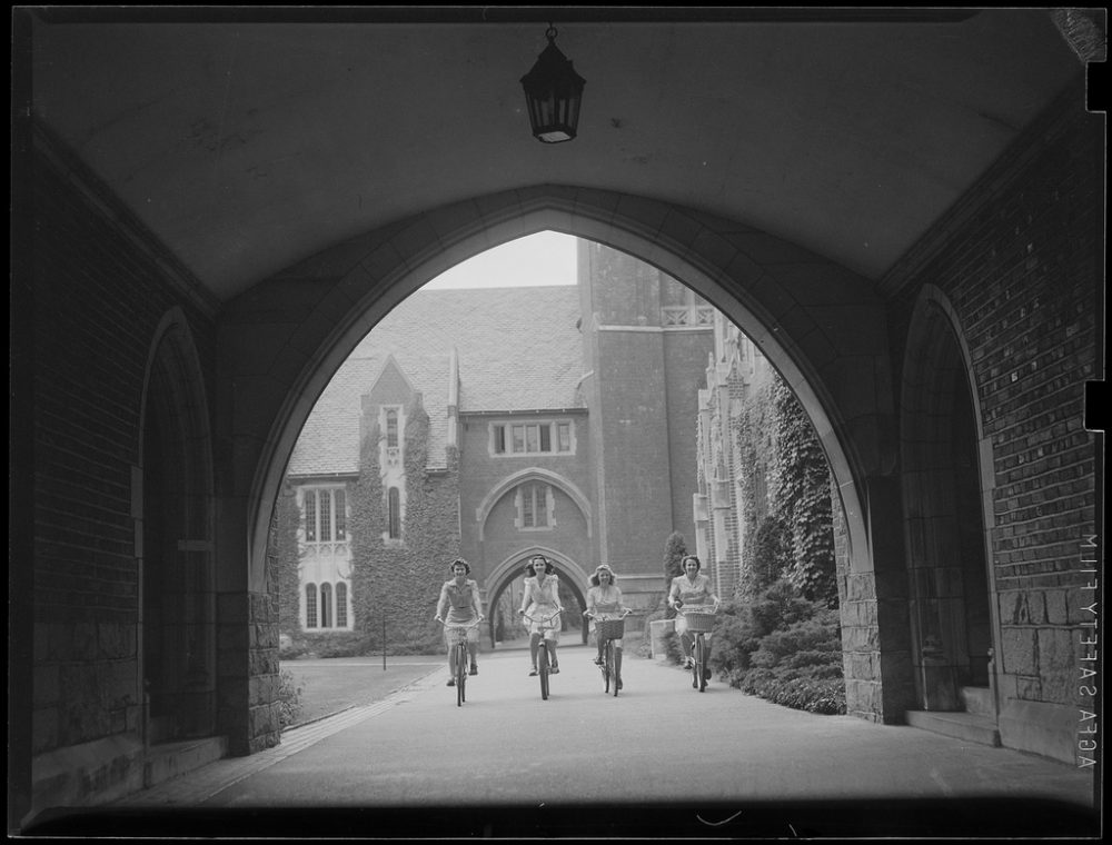 Wellesley students bicycle on campus. (Boston Public Library/Flickr)