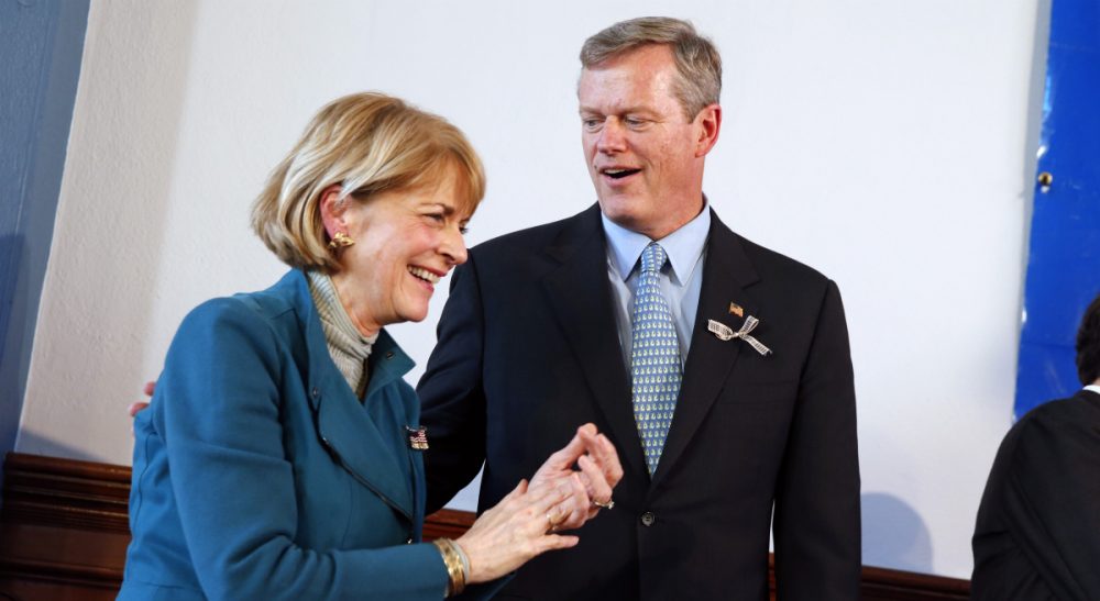 Massachusetts gubernatorial candidates, Democrat Martha Coakley, left, and Republican Charlie Baker stand together after participating in the Greater Boston Interfaith Candidates Forum at Fourth Presbyterian Church in Boston, Sunday, Oct. 26, 2014. (Michael Dwyer/AP)