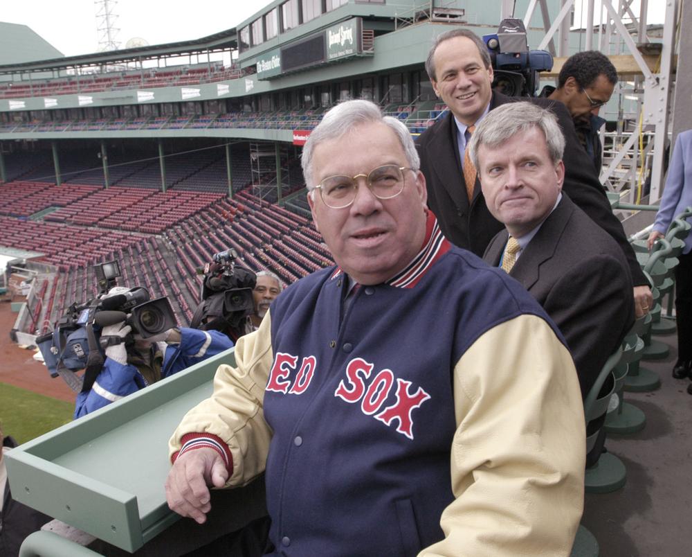 Mayor Menino is given a tour on April 3, 2003, of the new seating area above the Green Monster at Fenway Park. He's joined by Boston city services representative Mike Galvin, center, and Red Sox executive Larry Lucchino, background. (Josh Reynolds/AP)