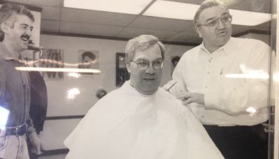 Mayor Tom Menino (center) with his barbers Gino Colafella (left) and John Cammarata. (Steve Brown/WBUR)