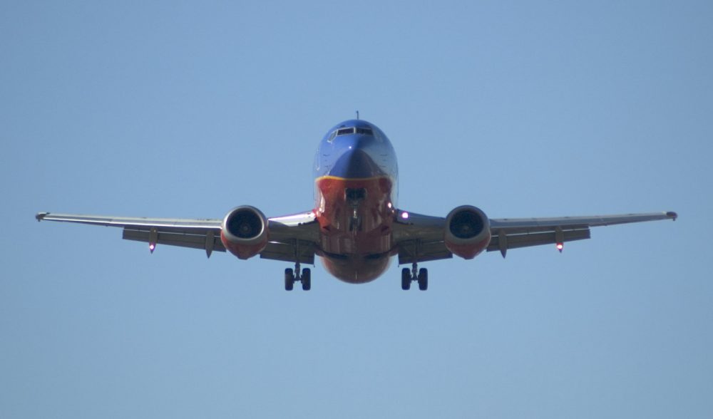 A Southwest Airlines flight Boeing 737 flies over Bachman Lake near Dallas (brentdanley/Flickr)