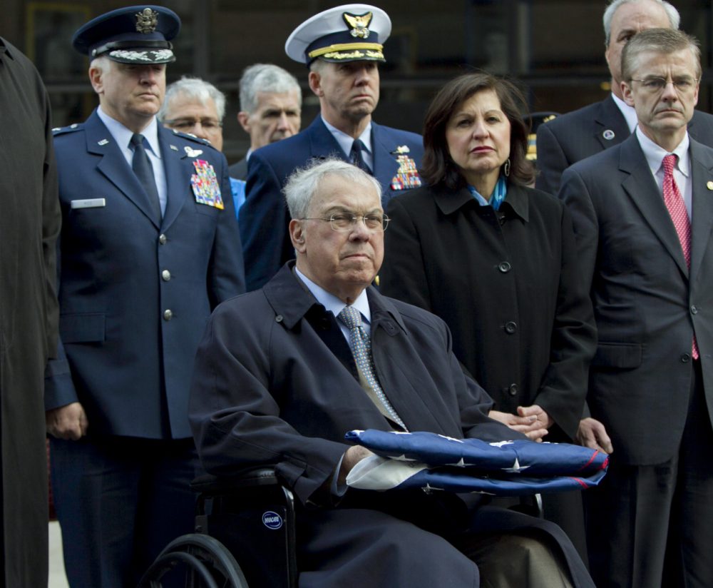 Menino. seated, recovering from a broken leg, U.S. Attorney Carmen Ortiz, second from right, and Special Agent in Charge of the FBI&#039;s Boston Field Office Richard DesLauriers, right, participate at a ceremony at the Boston Marathon blast site on Boylston Street on April 22, 2013. (Robert F. Bukaty/AP)