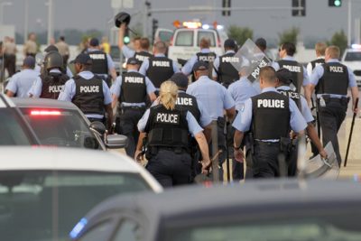 St. Louis city police stand down after an attempt to shut down interstate 70 was stifled, Wednesday, Sept. 10, 2014 in Berkeley, Mo. near the St. Louis suburb of Ferguson, Mo. where Michael Brown, an unarmed, black 18-year old was shot and killed by a white police officer on Aug. 9. (AP)