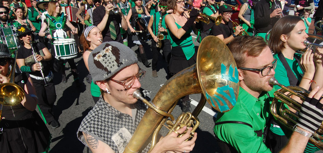 New York's Rude Mechanical Orchestra marches in the 2010 Honk Parade in Somerville. (Greg Cook)
