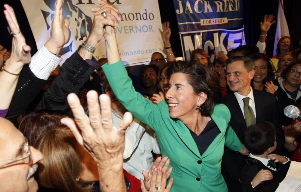 Democrat Gina Raimondo celebrates her win over Republican Allan Fung in the Rhode Island governor's race, Tuesday. (Stew Milne/AP)