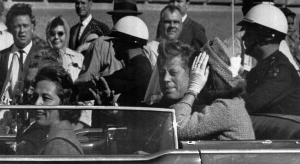 Garry Emmons: Perhaps a price we pay for the vigilance democracy requires is to tolerate the cuckoo theories to make room for those that merit further investigation. In this photo, President John F. Kennedy rides in a motorcade moments before he was shot and killed in Dallas, Tx., Nov. 22, 1963. (AP)