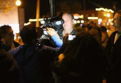 Demonstrators harass a CNN crew outside the police station as protests continue on October 22, 2014 in Ferguson, Missouri, in the wake of 18-year-old Michael Brown's death. Several days of civil unrest followed the August 9 shooting death of Brown by Ferguson police officer Darren Wilson. (Scott Olson/Getty Images)