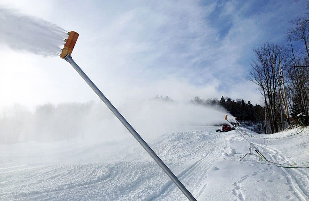 This undated image released by Mount Snow resort shows snowmakers preparing for ski season in Mount Snow, Vt. (Brendan Ryan/Mount Snow/AP)