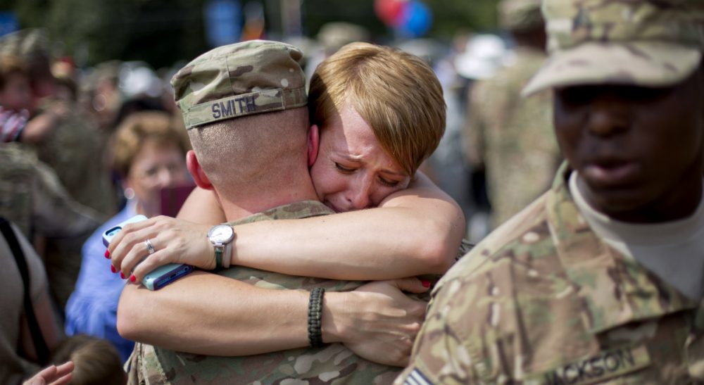 Some make the ultimate sacrifice, and others are never the same again. All of America's servicemen and women, however, endure a host of daily hardships while serving their country, and we owe them our gratitude. Pictured: Bailey Smith, right, embraces her husband Capt. Jared Smith, as he returns from a deployment to Afghanistan with the Georgia National Guard's 48th Infantry Brigade Combat Team, Tuesday, Sept. 16, 2014, in Macon, Ga. (David Goldman/AP)