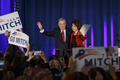 Senate Minority Leader Mitch McConnell of Ky., joined by his wife, former Labor Secretary Elaine Chao, celebrates with his supporters at an election night party in Louisville, Ky.,Tuesday, Nov. 4, 2014. (AP)