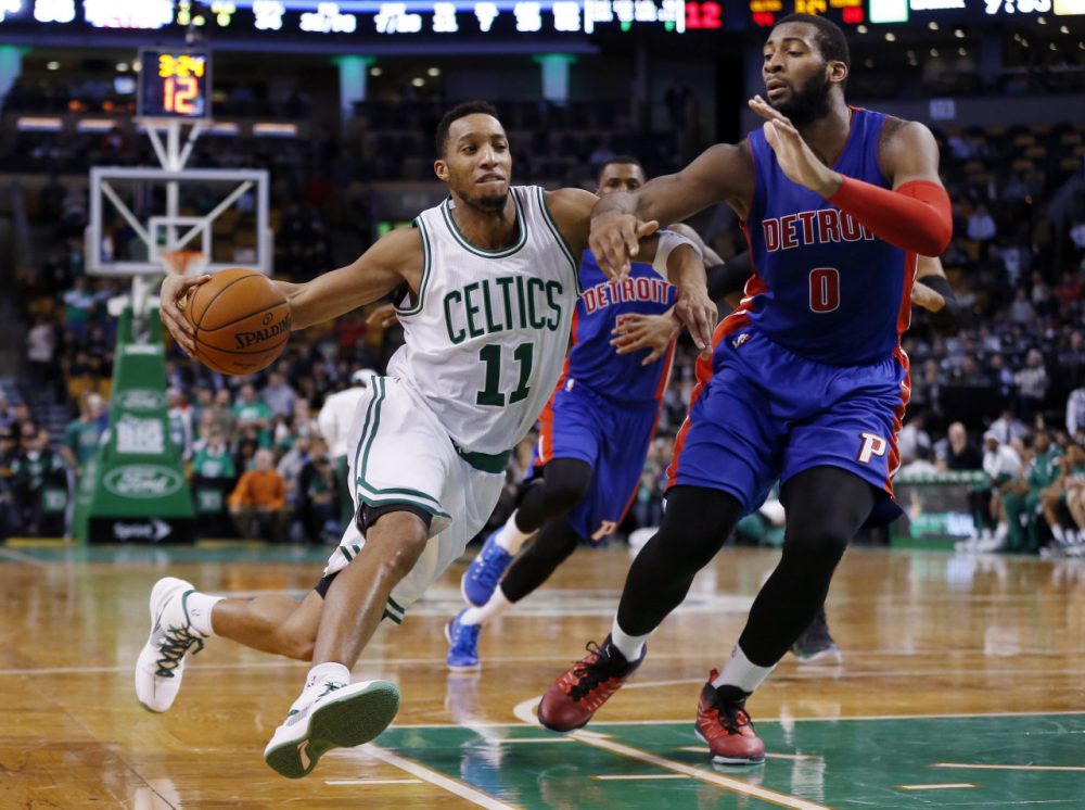 Boston Celtics guard Evan Turner (11) drives on Detroit Pistons center Andre Drummond (0) during the fourth quarter of an NBA basketball game in Boston on Wednesday. (Elise Amendola/AP)