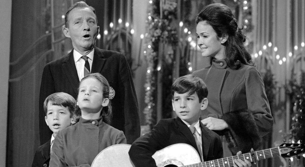 Peter May:  Here's a totally biased list of what songs should be on every loop of Christmas music on every station, streaming or on your car radio. Pictured: Bing Crosby belts out a tune, joined by his wife, Kathryn, and their three children: Nathaniel, 7; Mary Frances, 9, and Harry Lillis, 11 (left to right) in Los Angeles, Dec. 12, 1968. (David F. Smith/AP)