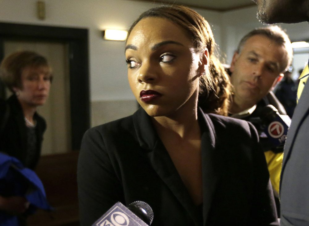 Shayanna Jenkins, fiancee of former New England Patriots tight end Aaron Hernandez, departs Suffolk Superior Court following Hernandez's arraignment on murder charges in May 2014. (Steven Senne/AP)