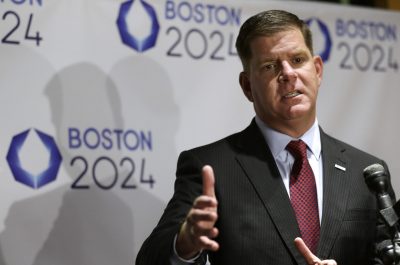Boston Mayor Marty Walsh addresses an audience during an event held to generate public interest in a 2024 Olympics bid for the city of Boston. (Steven Senne/AP)