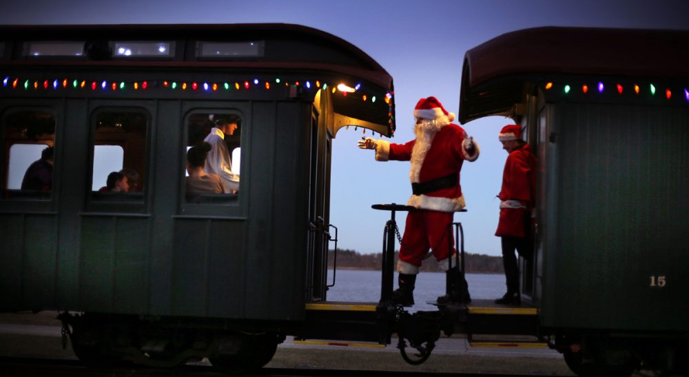 Susan E. Reed: Christmas is not only about the child of the star, but creativity in general, including the birth of ideas, which require first, an adventurous departure from the known. Pictured: Santa Claus moves between cars greeting passengers in Portland, Maine. (Robert F. Bukaty/AP)