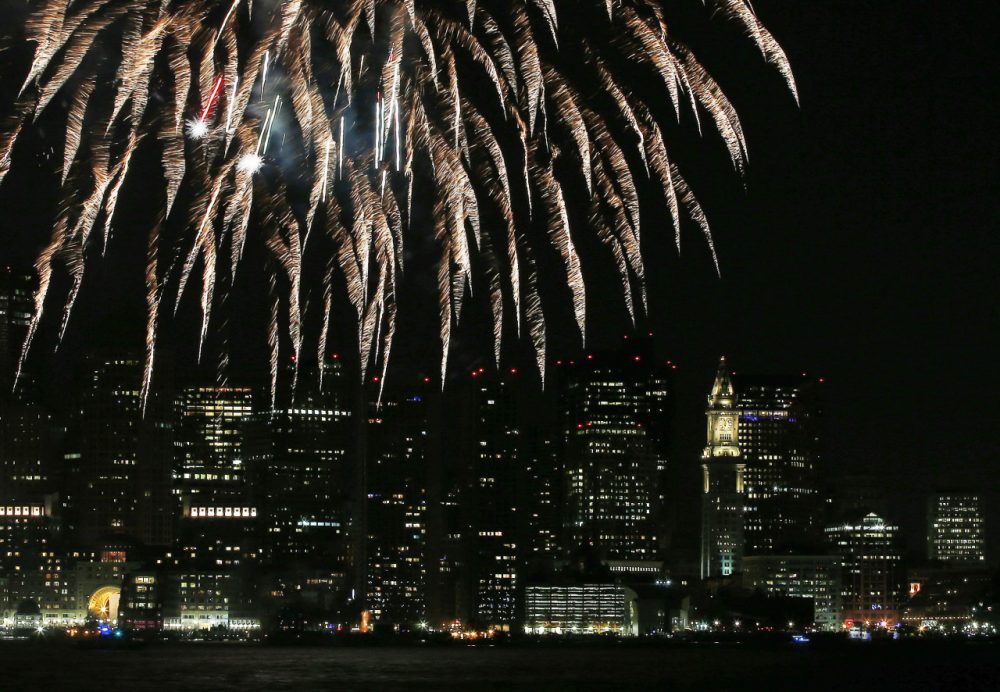 Fireworks lighting up the sky over Boston Harbor celebrating First Night in Boston, Jan. 1, 2014. (Elise Amendola/AP File)