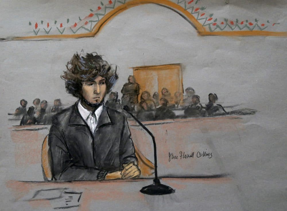 In this courtroom sketch, Boston Marathon bombing suspect Dzhokhar Tsarnaev is depicted sitting in federal court in Boston in 2014. (Jane Flavell Collins/AP)
