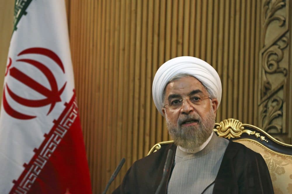 In this file photo taken Monday, Sept. 22, 2014, Iranian President Hassan Rouhani briefs media prior to departing Mehrabad airport to attend the United Nations General Assembly, in Tehran, Iran. Rouhani said Sunday, Jan. 4, 2015, that ongoing nuclear negotiations with world powers are a matter of &quot;heart,&quot; not just centrifuges ahead of talks next week in Geneva. (Vahid Salemi/AP)