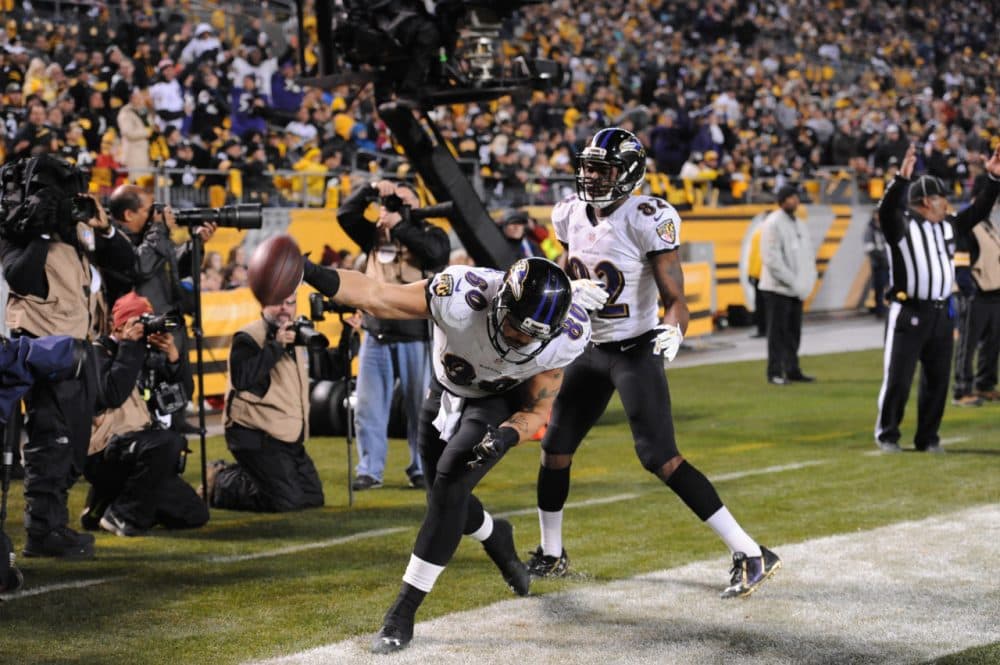 Baltimore  tight end Crockett Gillmore (80) celebrates a score in the Ravens' 30-17 Wild Card win over the Steelers. (Don Wright/AP)