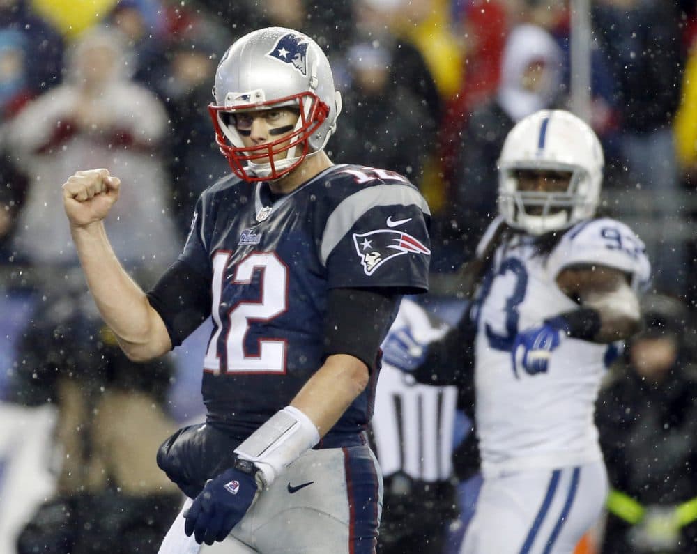 Tom Brady threw for three touchdowns in the Patriots' 45-7 win over the Colts. (Elise Amendola/AP)