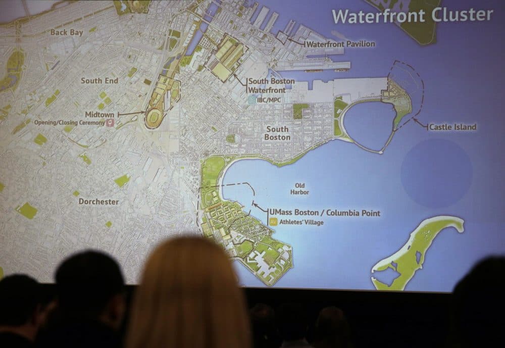 Reporters view a video display of the sites of the potential Olympic stadium, athlete's villages and media centers during a news conference by organizers of Boston's campaign for the 2024 Summer Olympics. (Charles Krupa/AP)