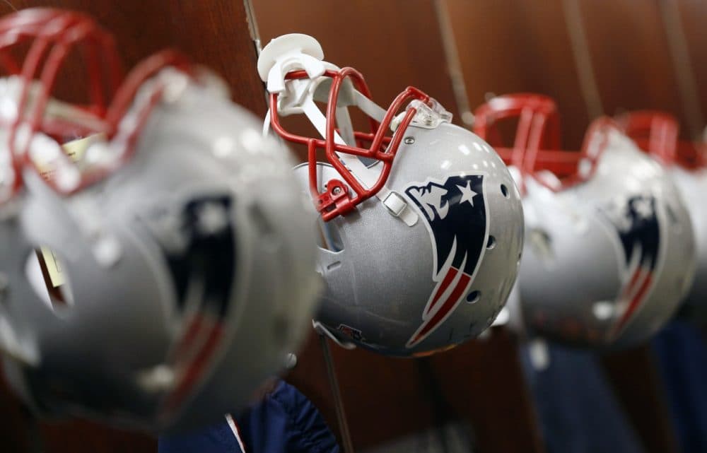 New England Patriots helmets are seen in the team locker room at Gillette Stadium last year. (Michael Dwyer/AP)