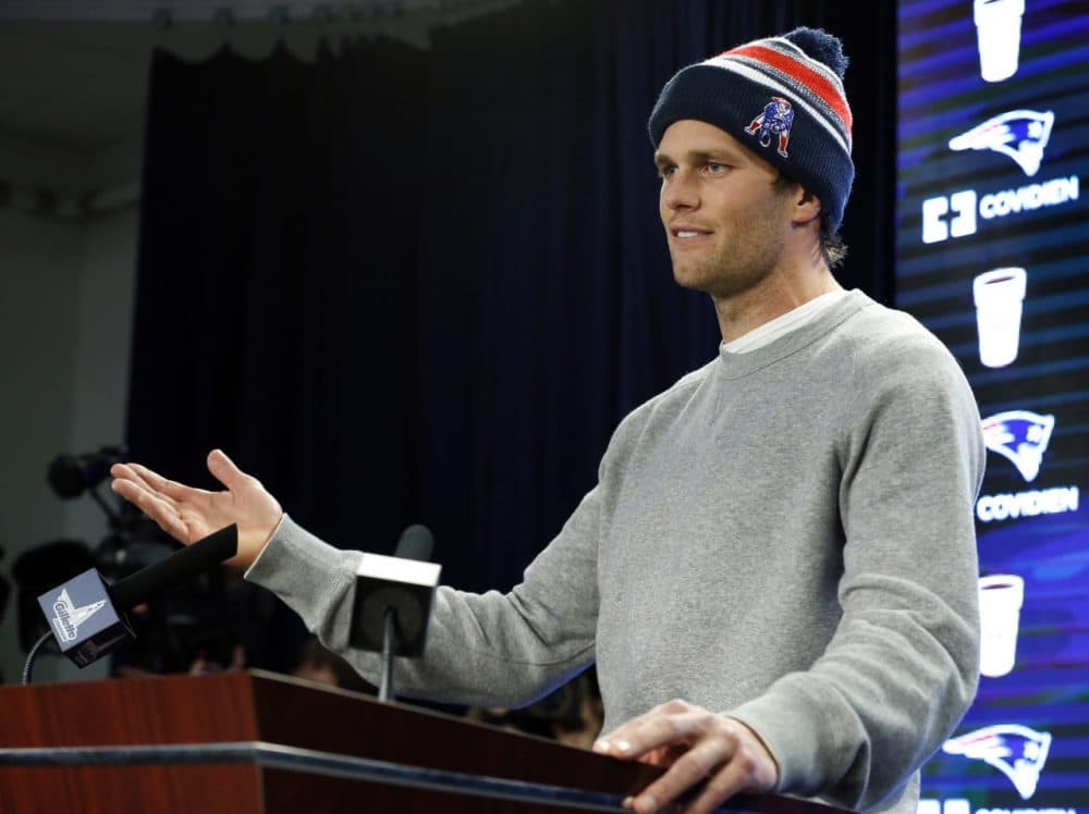 Patriots quarterback Tom Brady answers questions from reporters at a news conference in Foxborough Thursday. (Elise Amendola/AP)