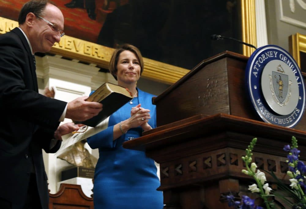 Maura Healey is sworn in as Massachusetts' 55th attorney general during a ceremony at Faneuil Hall in Boston Wednesday. Massachusetts Supreme Judicial Court Chief Justice Ralph Gants, left, administered the oath (Elise Amendola/AP)