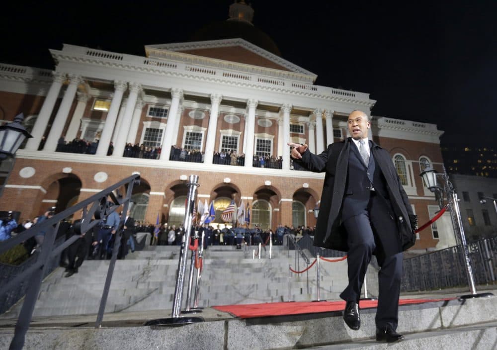 Signifying his final day in office, Gov. Deval Patrick completes the traditional &quot;lone walk&quot; down the stairs in front of the State House Wednesday, Jan. 7, 2015. (Steven Senne/AP)