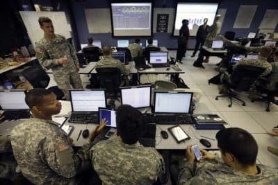 In this file photo, United States Military Academy cadets watch data on computers at the Cyber Research Center at the United States Military Academy in West Point, N.Y., Wednesday, April 9, 2014.  (AP)
