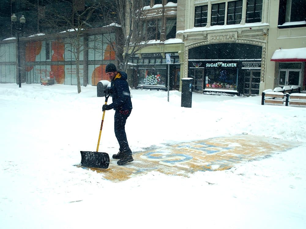 Chris Laudani shovels the Boston Marathon finish line during a major snow storm in Boston. Laudani was the focus of a massive internet search to determine who it was that shoveled the finish line. (Adam Reynolds)