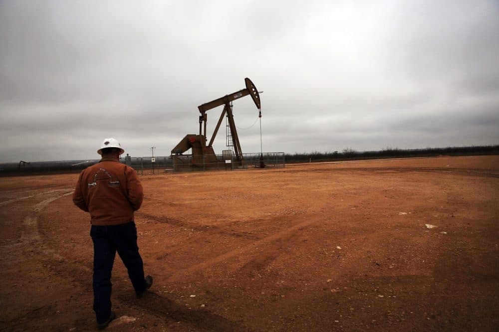 An oil well owned an operated by Apache Corporation in the Permian Basin are viewed on February 5, 2015 in Garden City, Texas. The well produces about 55-70 barrels of oil per day. As crude oil prices have fallen nearly 60 percent globally, many American communities that became dependent on oil revenue are preparing for hard times. Texas, which benefited from hydraulic fracturing and the shale drilling revolution, tripled its production of oil in the last five years. The Texan economy saw hundreds of billions of dollars come into the state before the global plunge in prices. Across the state drilling budgets are being slashed and companies are notifying workers of upcoming layoffs. According to federal labor statistics, around 300,000 people work in the Texas oil and gas industry, 50 percent more than four years ago. (Spencer Platt/Getty Images)