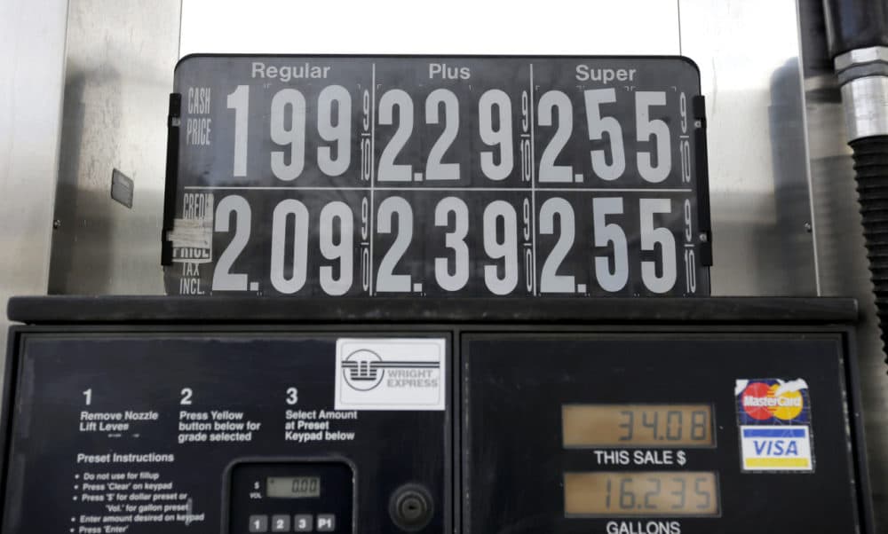 Earlier this year, gas prices on Jan. 7 were listed for a cash price of $1.99 per gallon in Boston. (Steven Senne/AP)
