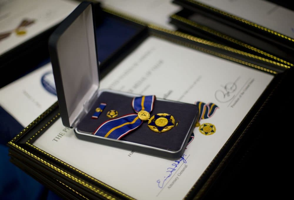 The Medal of Valor Award is seen at the White House Wednesday. Medals are awarded to public safety officers who have exhibited exceptional courage, regardless of personal safety, in the attempt to save or protect others from harm. (Pablo Martinez Monsivais/AP)