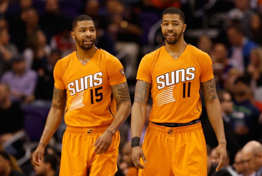 The Phoenix Suns' roster includes identical twins Marcus and Markieff Morris (l-r), but the team also has another set of brothers: Goran and Zoran Dragic. (Christian Petersen/Getty Images)