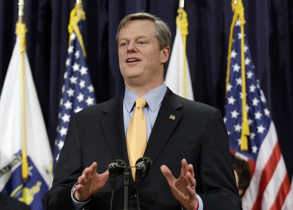 Gov. Charlie Baker speaks at a news conference in Boston Friday, where he named a seven-member panel of experts in transportation, economic development and municipal planning to come up with a fix for the troubled MBTA. (Elise Amendola/AP)