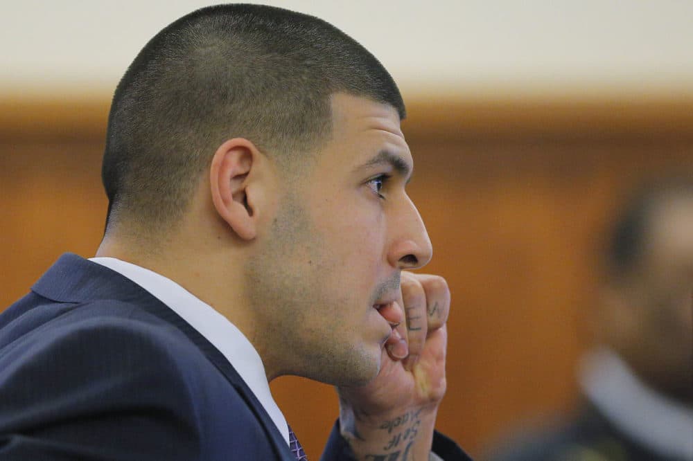 Former New England Patriots player Aaron Hernandez listens during testimony at his murder trial at Bristol County Superior Court in Fall River, Mass., Tuesday. (Brian Snyder/AP, Pool)