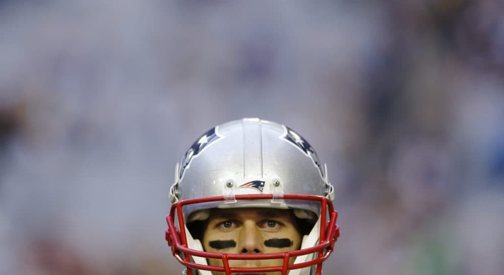 New England Patriots quarterback Tom Brady watches during warm ups before the NFL Super Bowl XLIX football game against the Seattle Seahawks Sunday, Feb. 1, 2015, in Glendale, Ariz.(Patrick Semansky/AP)